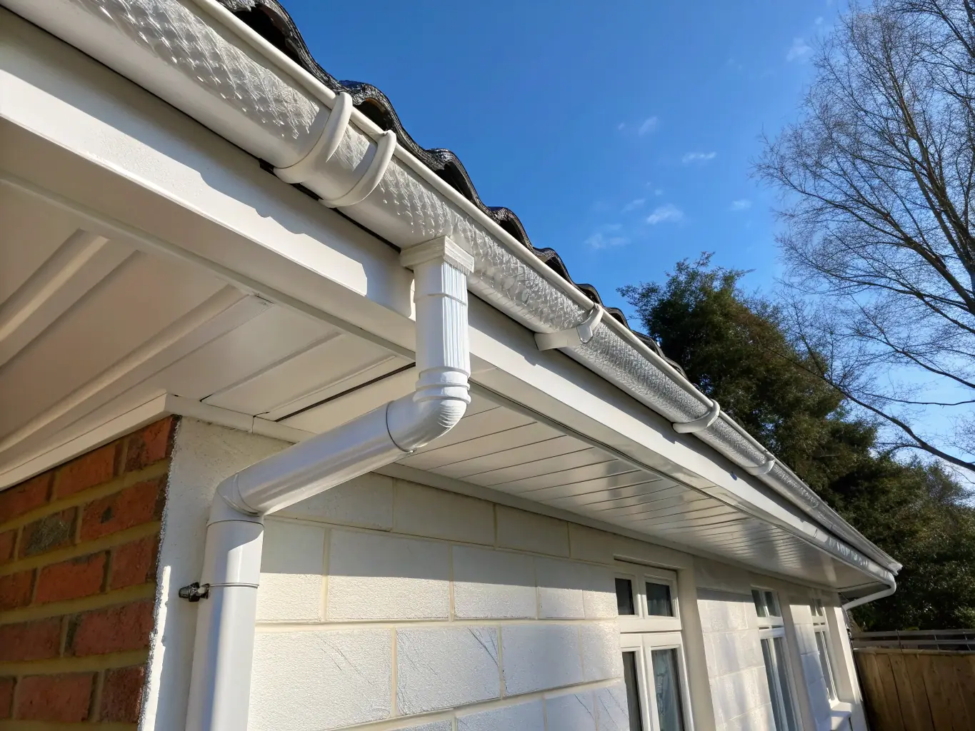 A detailed shot of a fascia and soffit system installed by L&V Siding, highlighting the clean lines, proper ventilation, and overall quality of the work.